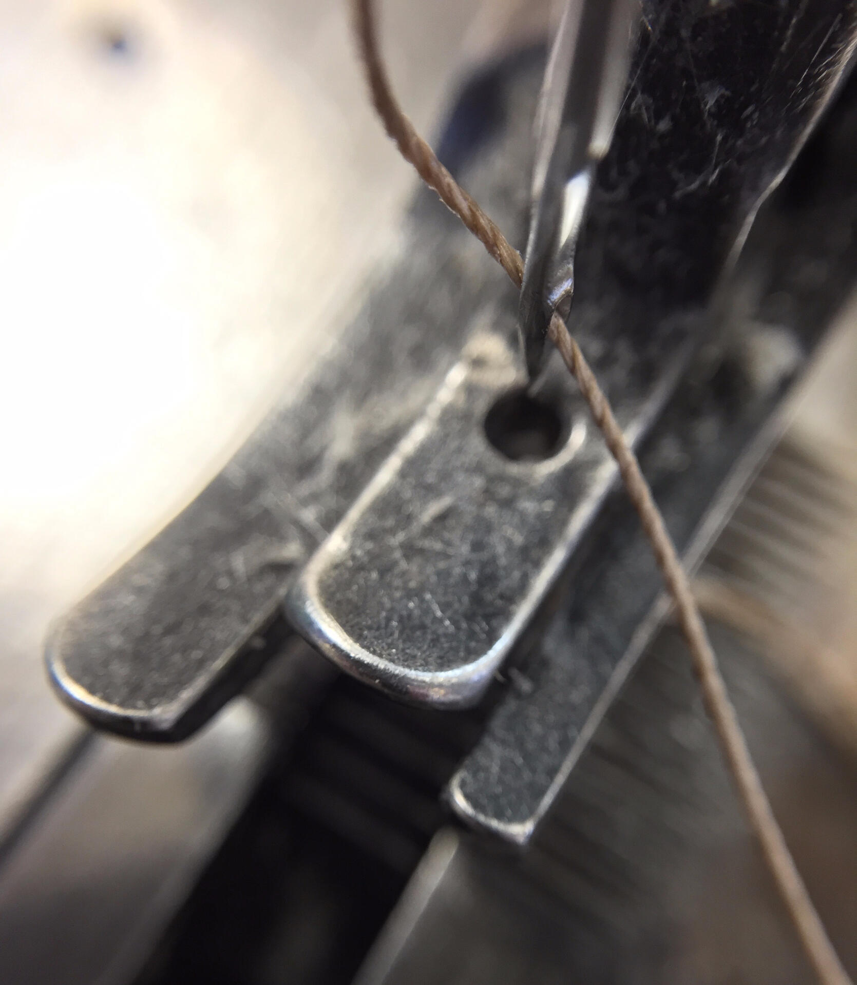 Consew industrial sewing machine with fiberglass thread.